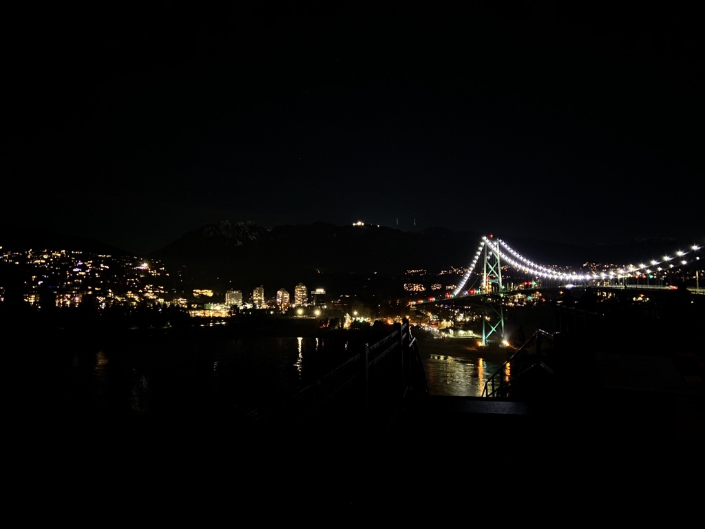 Stanley Park Prospect Point outlook at night viewing West Vancouver and Lions Gate Bridge